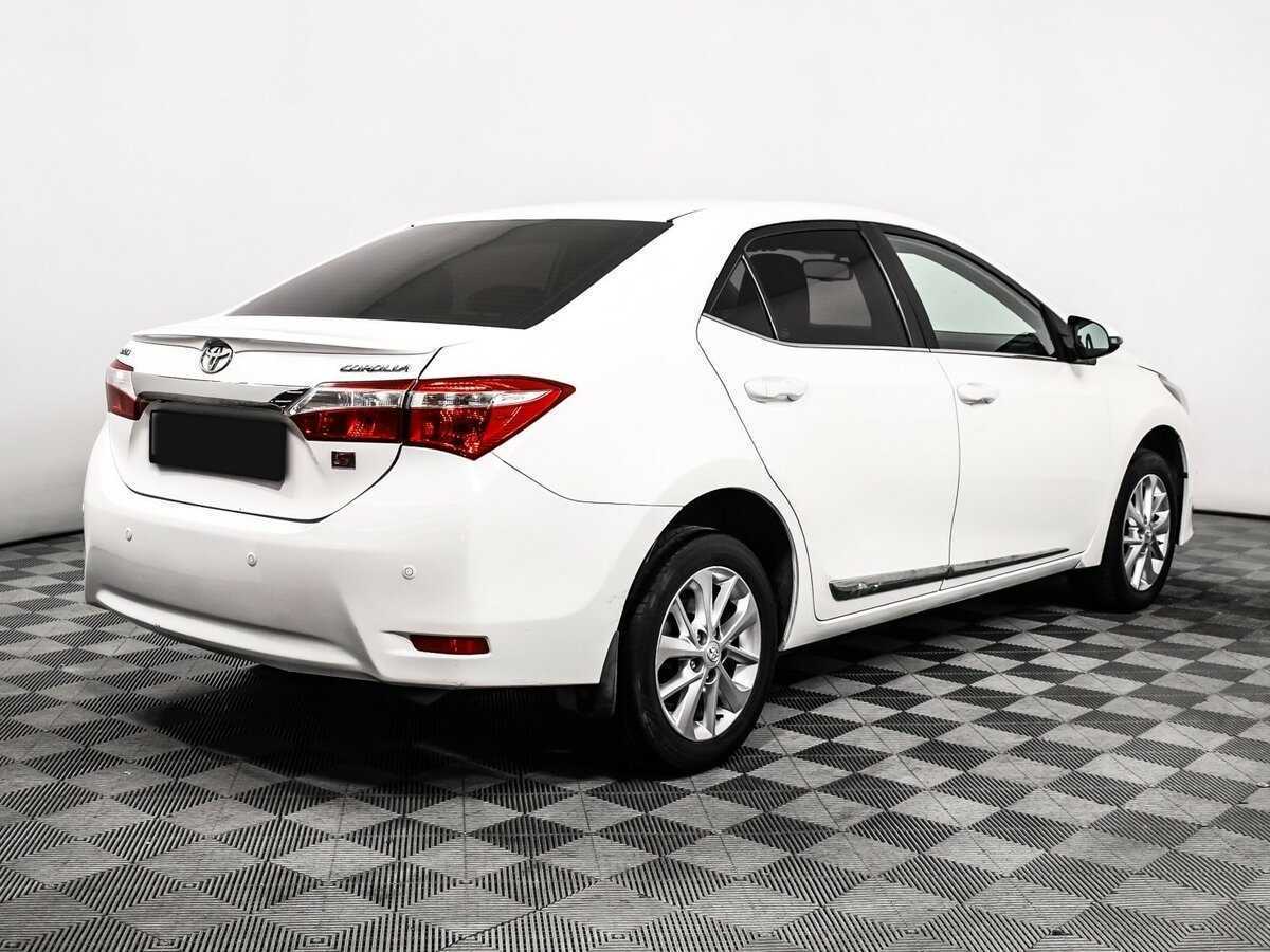 Toyota Corolla 2013 года с пробегом. Фото: #4