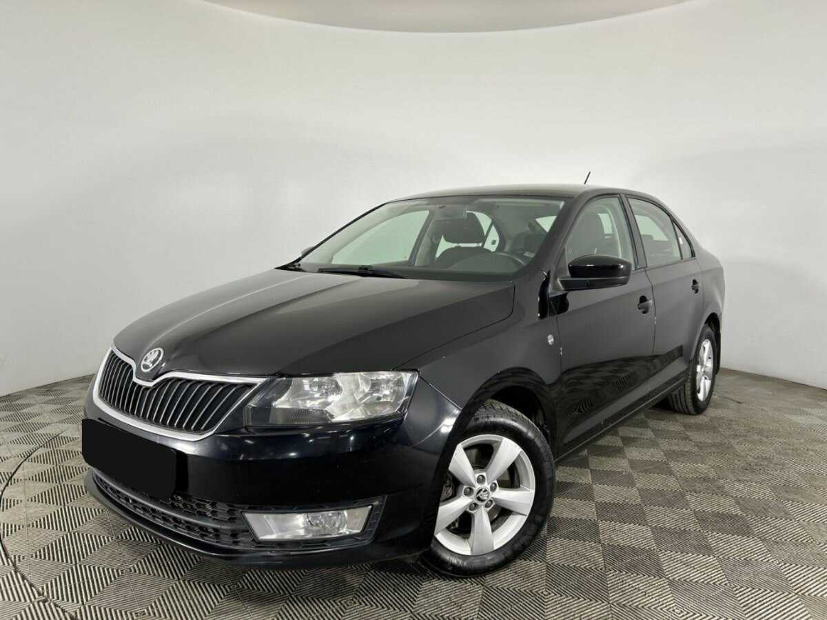 Skoda Rapid 2014 года с пробегом. Посмотреть фото