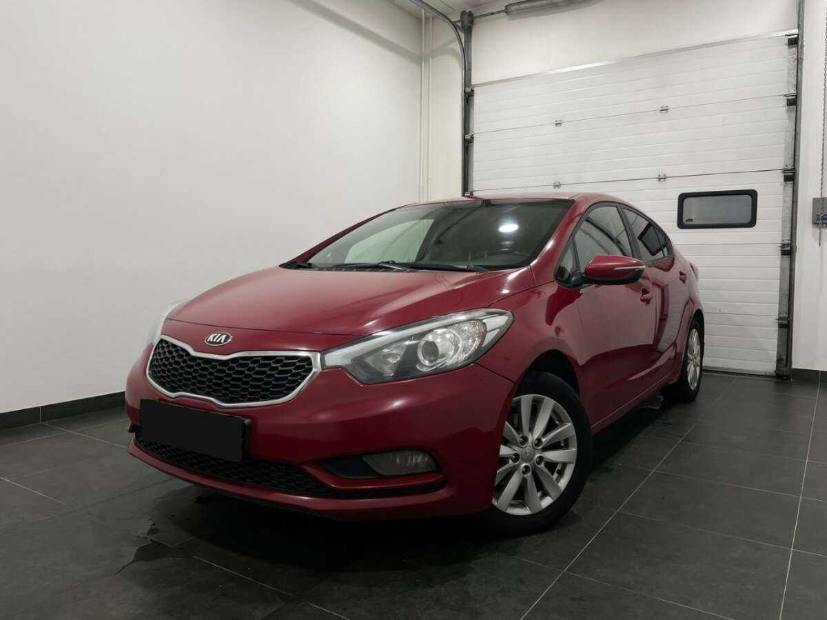 Kia Cerato 2013 года с пробегом. Посмотреть фото