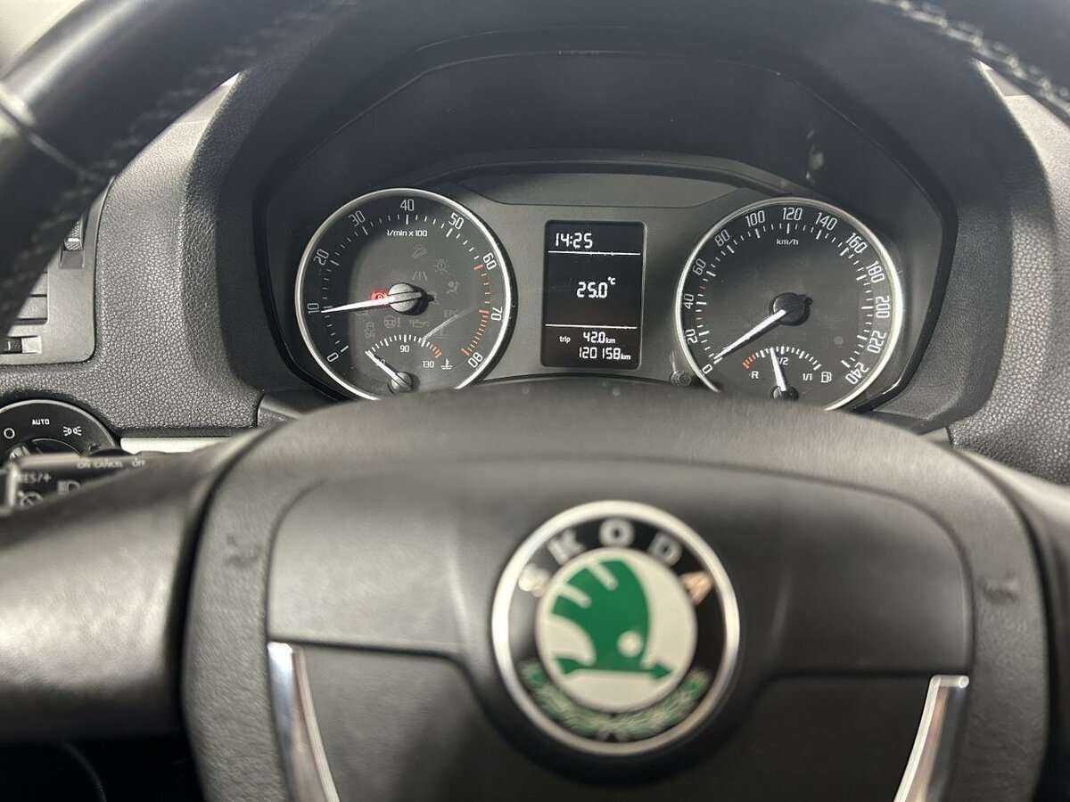 Skoda Octavia 2012 года с пробегом. Фото: #10
