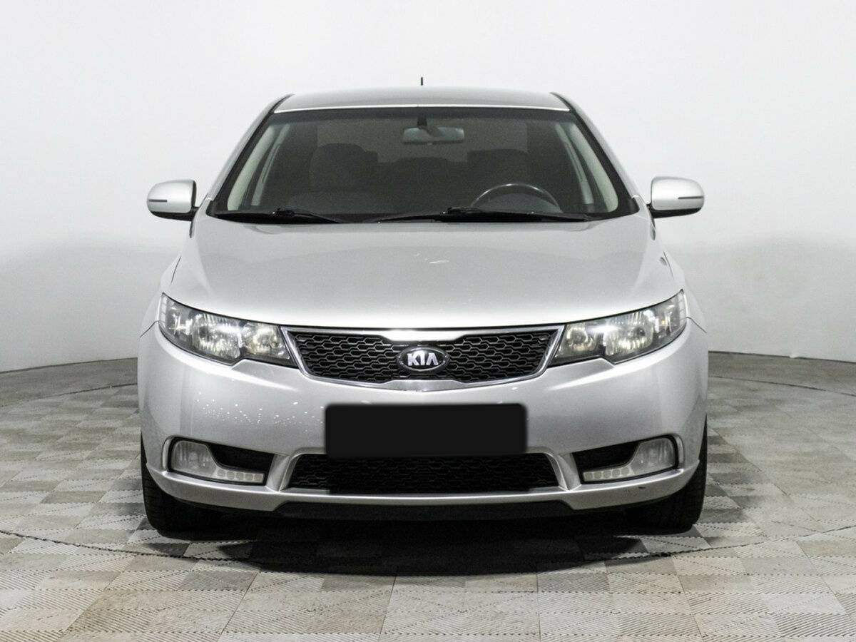 Kia Cerato 2012 года с пробегом. Фото: #1