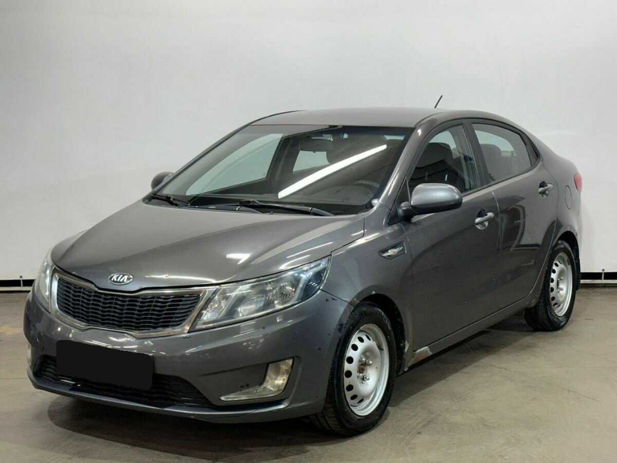 Kia Rio 2013 года с пробегом. Посмотреть фото