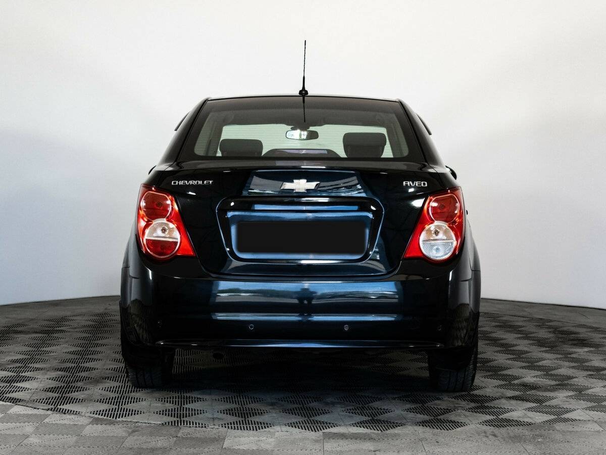 Chevrolet Aveo 2014 года с пробегом. Фото: #5