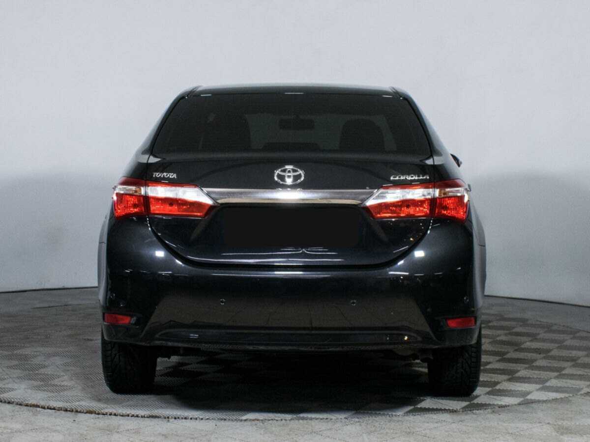 Toyota Corolla 2013 года с пробегом. Фото: #5