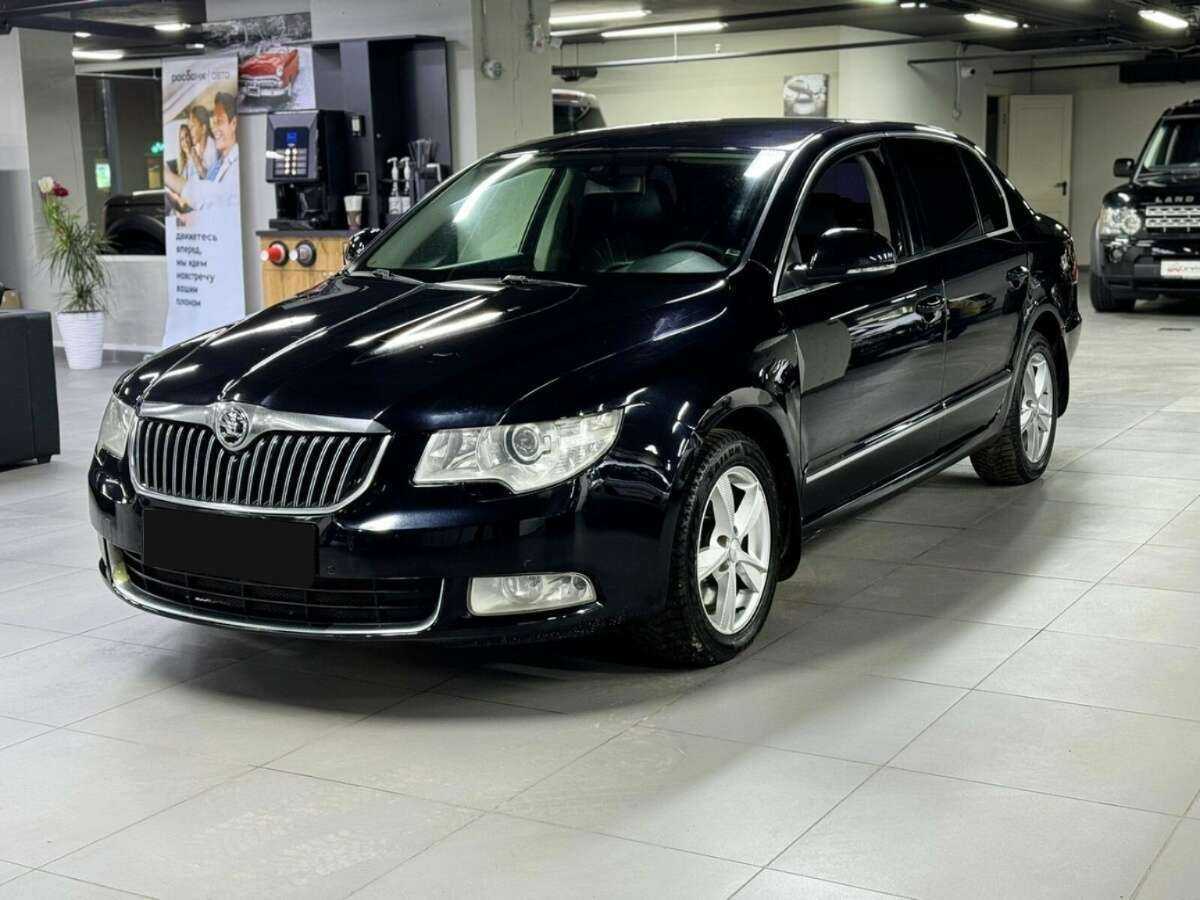 Skoda Superb 2013 года с пробегом. Посмотреть фото