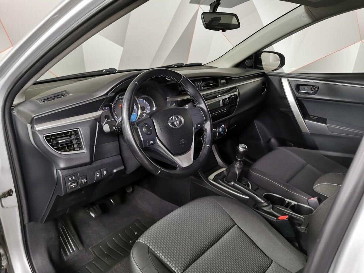 Toyota Corolla 2013 года с пробегом. Фото: #13