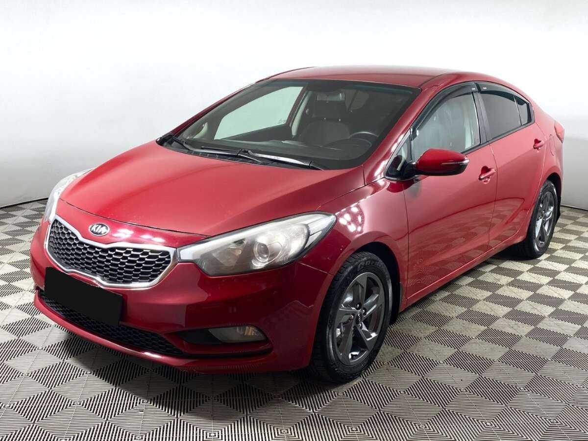 Kia Cerato 2013 года с пробегом. Посмотреть фото