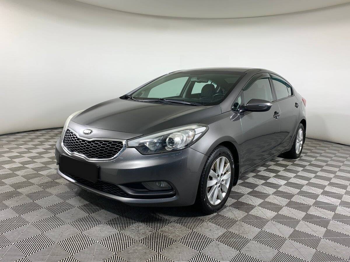 Kia Cerato 2013 года с пробегом. Посмотреть фото