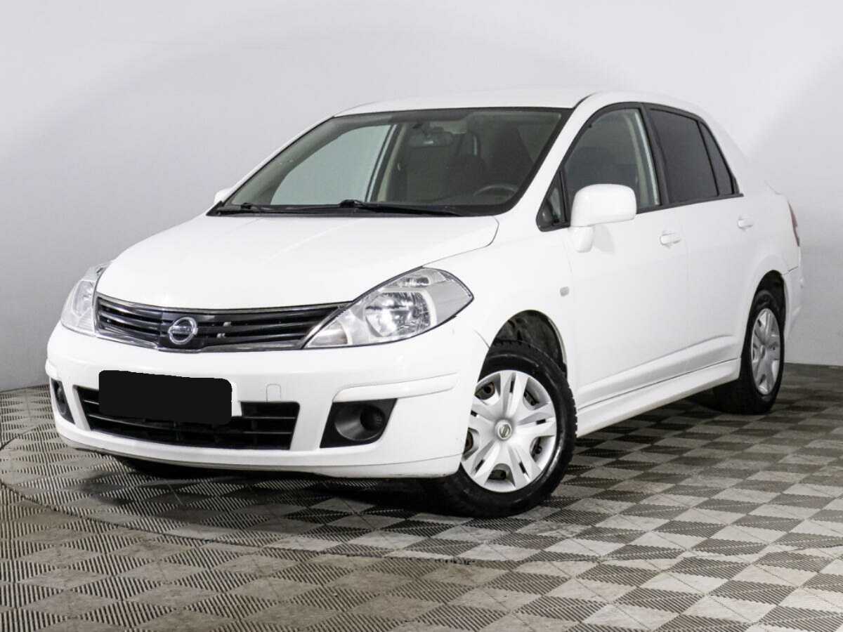 Nissan Tiida 2013 года с пробегом. Фото: #0